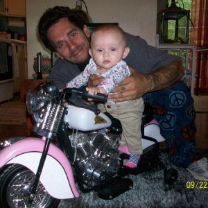 My hubby, Billy, and Amaya on her new indian ;)