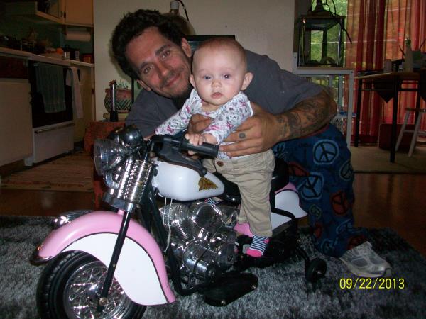 My hubby, Billy, and Amaya on her new indian ;)